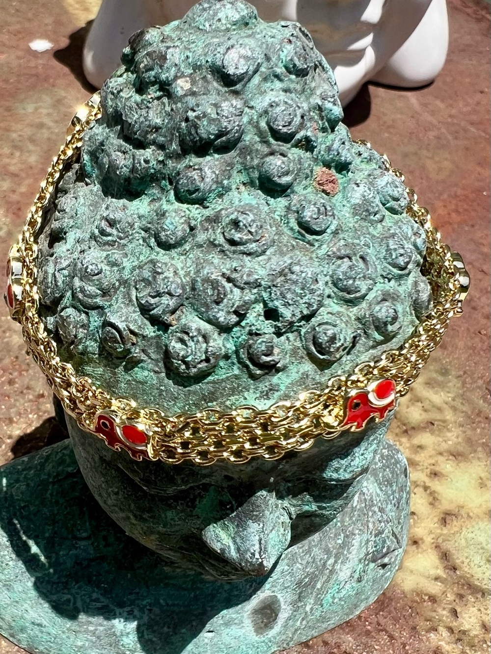 18k Gold Plated Multi-Strand
Bracelet with Red Elephant Accents